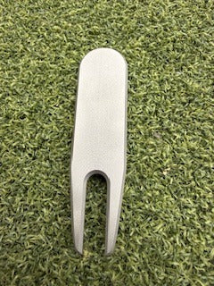 "TEST" divot tool