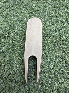 "TEST" divot tool