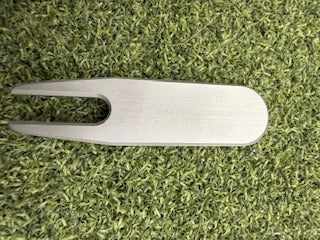"TEST" divot tool