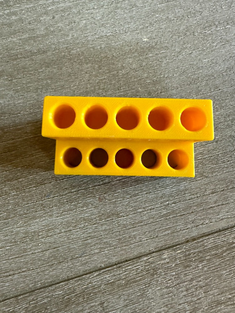 3D Printed display to hold 10 each Kraken Divot tools.